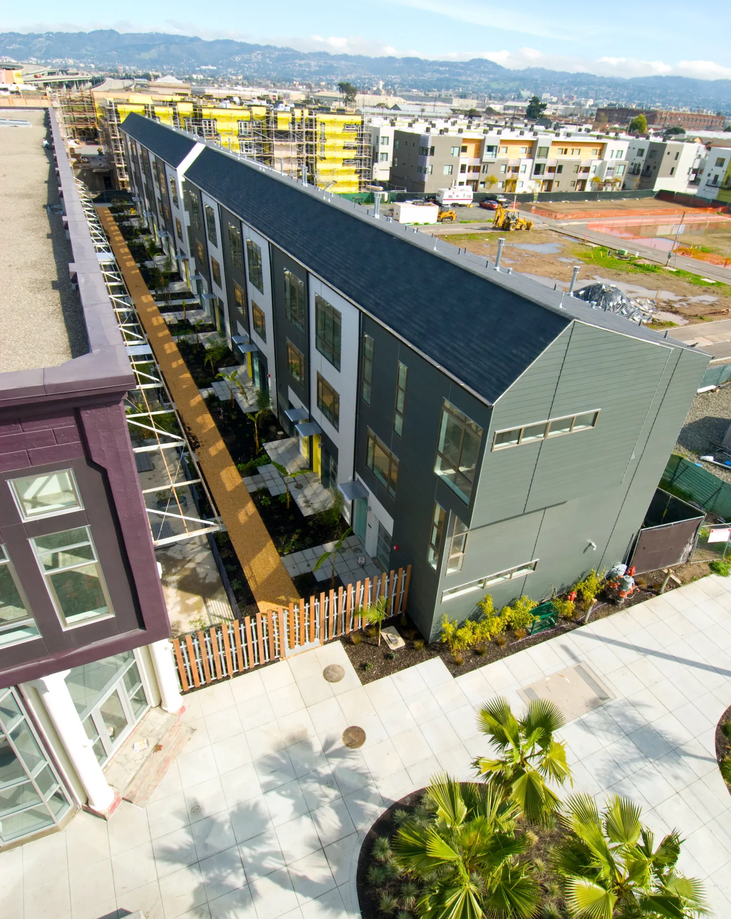 View of the resident pathway from above at Pacific Cannery Lofts in Oakland, California.