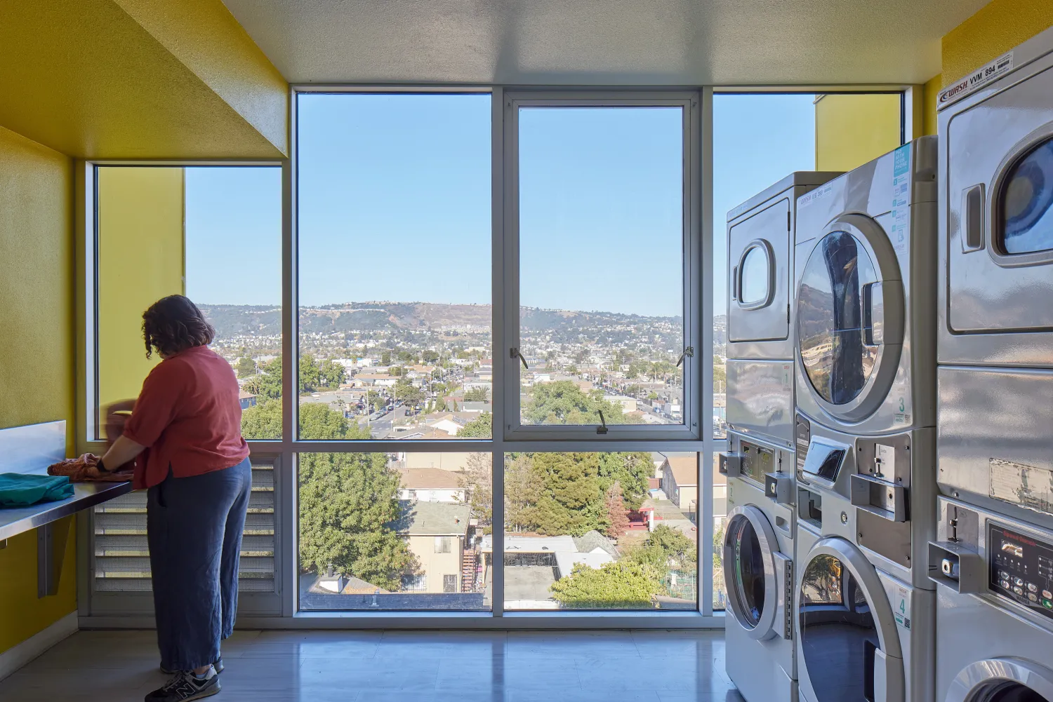 Laundry room inside Coliseum Place in Oakland, California.