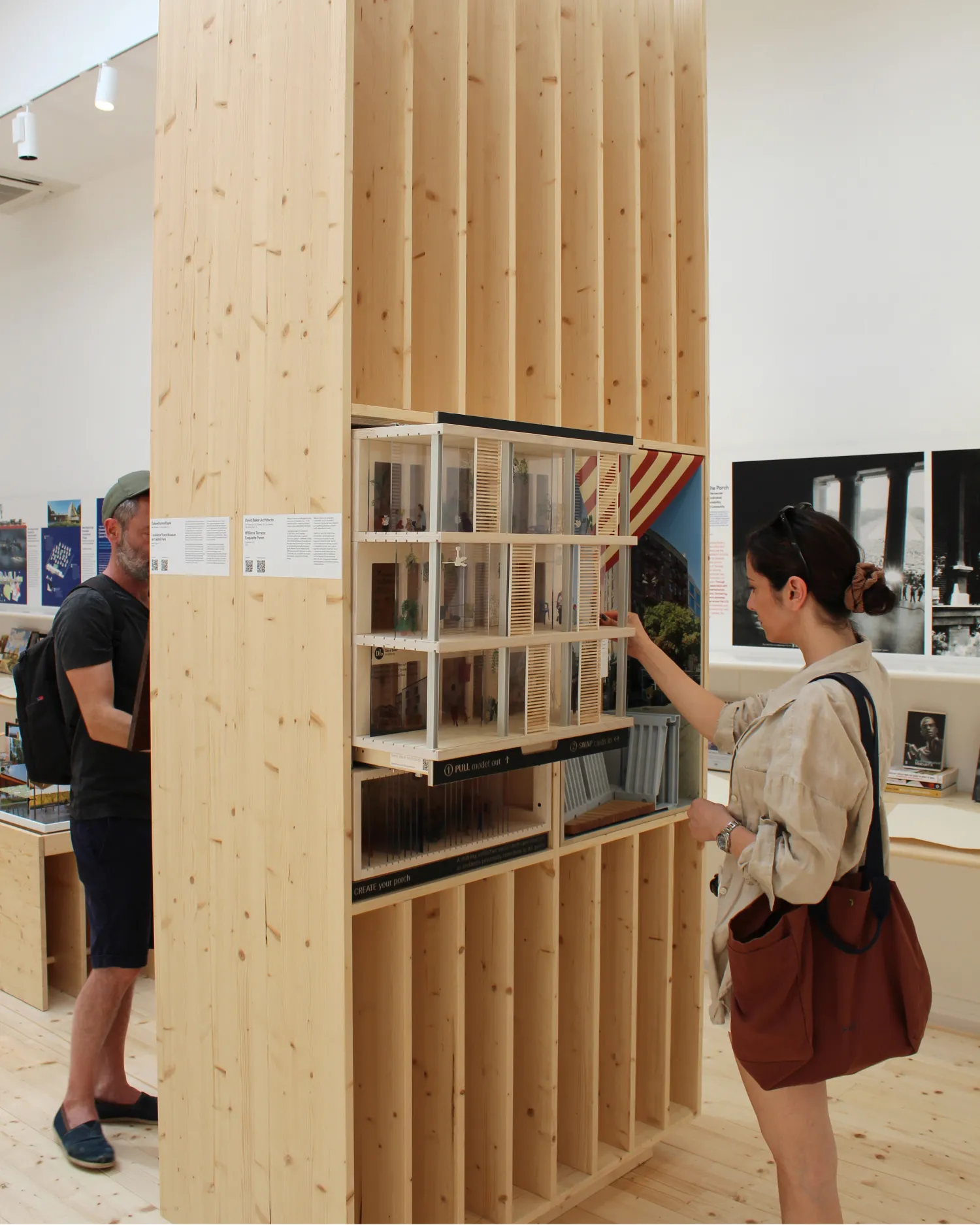 Woman interacting with diorama
