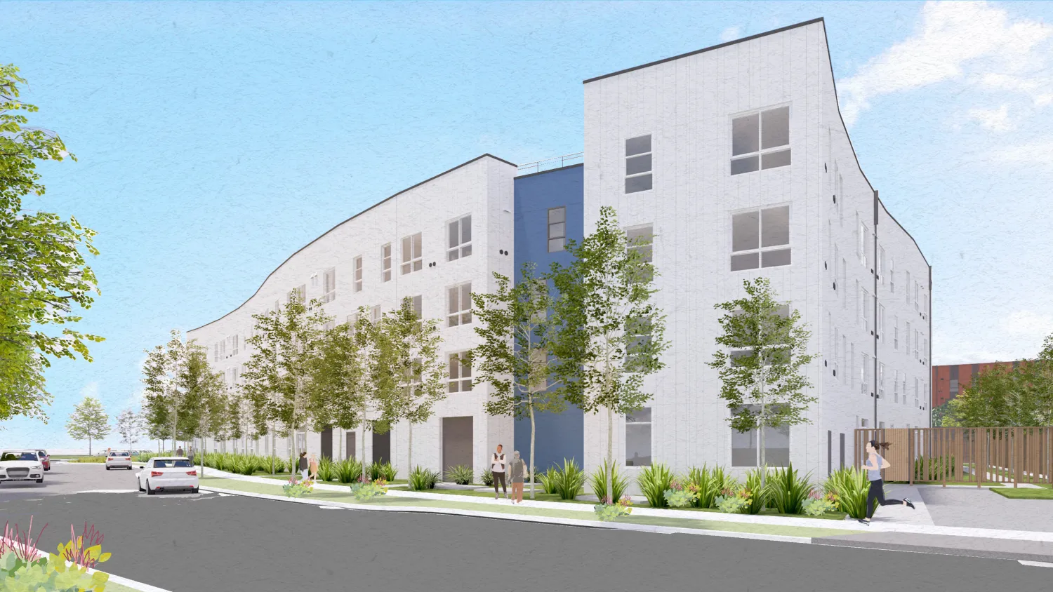 White building with blue and trees in foreground and blue sky background