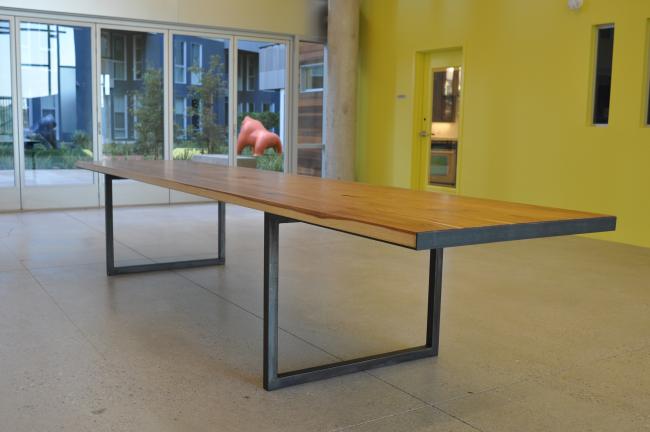 Custom community room table at Station Center Family Housing in Union City, Ca