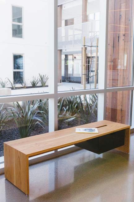 Custom bench in the leasing lounge at Foundry Commons in San Jose, Ca.