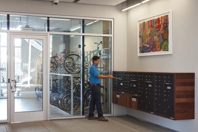 Bicycle parking and mailboxes inside Mayfield Place in Palo Alto, Ca.