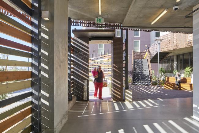 Open-air entrance of Pacific Point Apartments in San Francisco, CA.