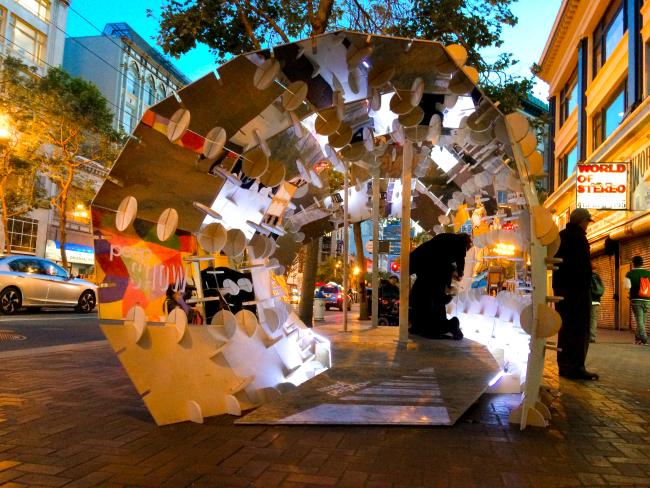 DBA's installation, PeepSHOW, for the Market Street Prototyping Festival in San Francisco at dusk.
