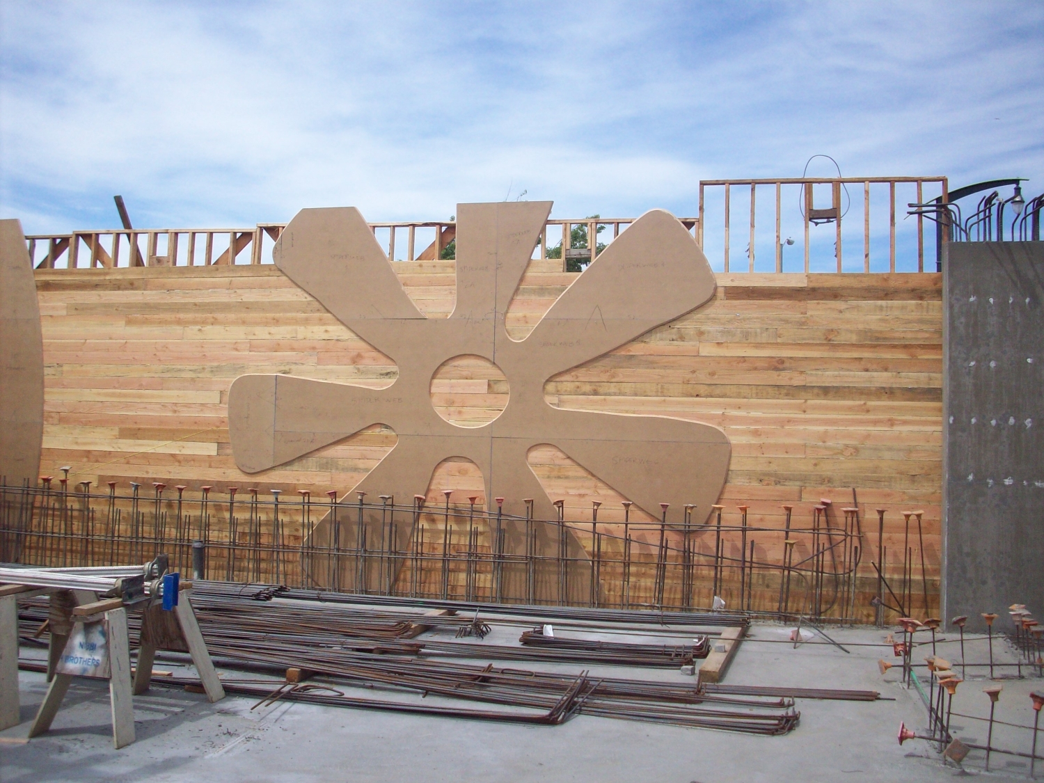 Flower shaped symbol being place during construction of Armstrong Place Senior in San Francisco.