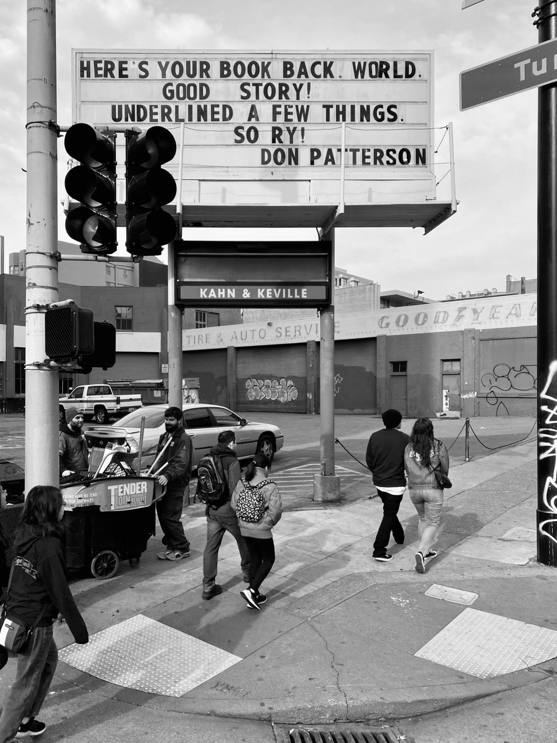 Sign at previous 555 Larkin location that states "Here's your book back. World. Good Story! Underlined a few things. So Ry! - Don Patterson"