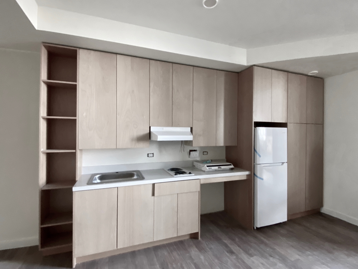 Kitchen inside the mod during construction for Tahanan Supportive Housing in San Francisco.