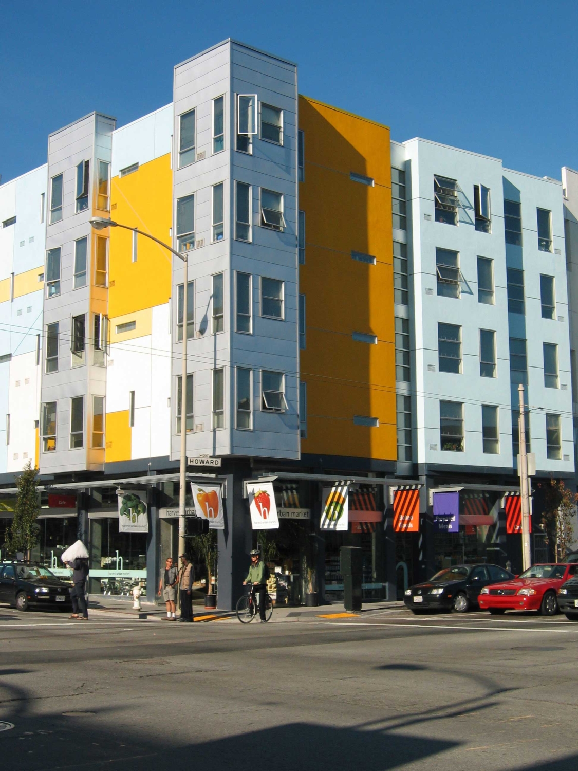 Exterior elevation with grocery store entrance at 8th & Howard/SOMA Studios in San Francisco, Ca.