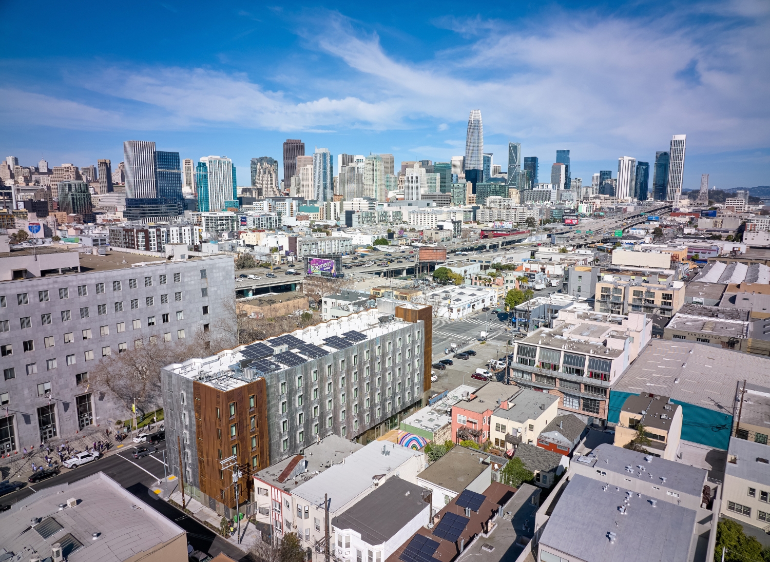 Aerial view of SoMa in San Francisco, with Tahanan in the foreground and downtown San Francisco in the background.
