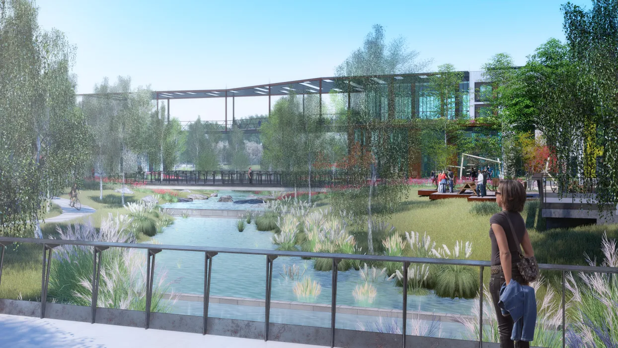 Exterior rendering showing the water running through the park at Housing Northwest Arkansas Initiative.