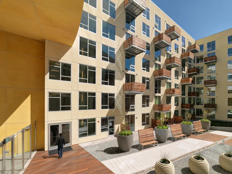 Courtyard with benches and planters at Rincon Green in San Francisco.