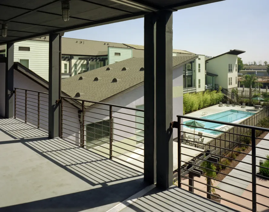 View of the pool and courtyard from the second level at Lenzen Square in San Jose, California.