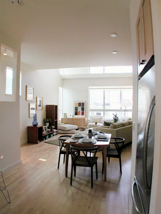 Kitchen and living area on the second floor of a unit at Magnolia Row in West Oakland, California.