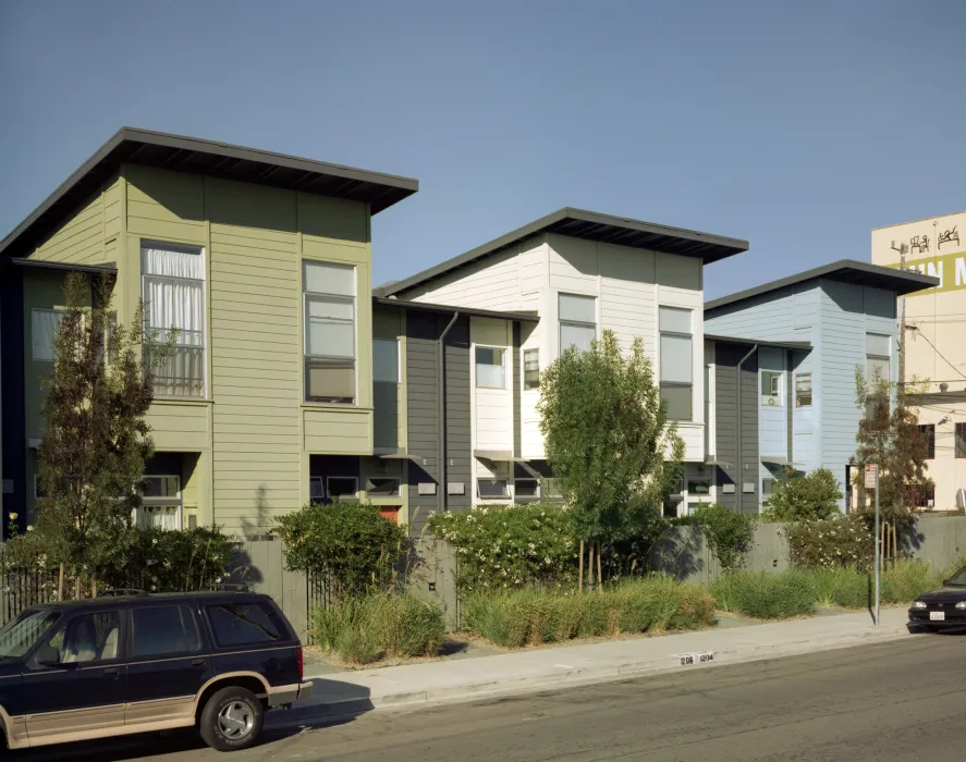 Exterior street view of Magnolia Row in West Oakland, California.