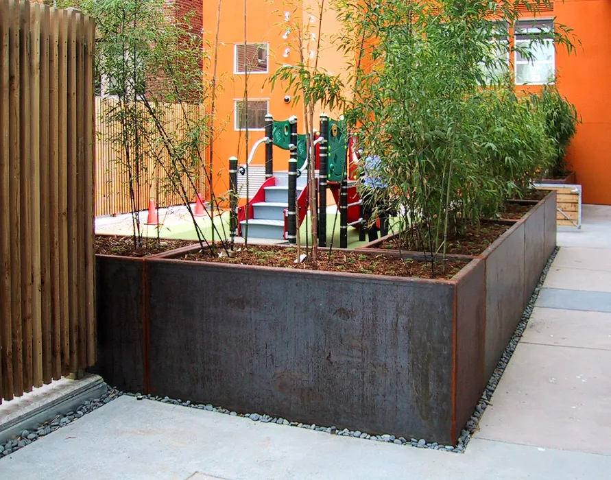 Corten planters at Folsom-Dore Supportive Apartments in San Francisco, California.