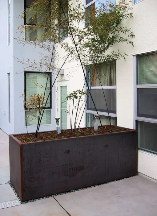 Corten planters at Folsom-Dore Supportive Apartments in San Francisco, California.