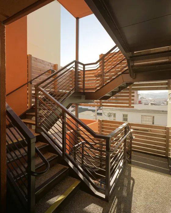 Stairs inside of Folsom-Dore Supportive Apartments in San Francisco, California.