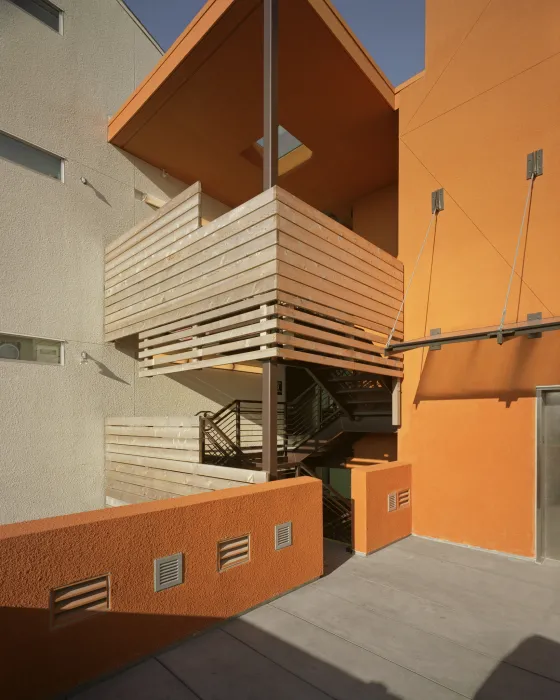 Open-air stairs at Folsom-Dore Supportive Apartments in San Francisco, California.