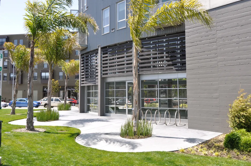 Greenery and bike parking at 888 Seventh Street in San Francisco.