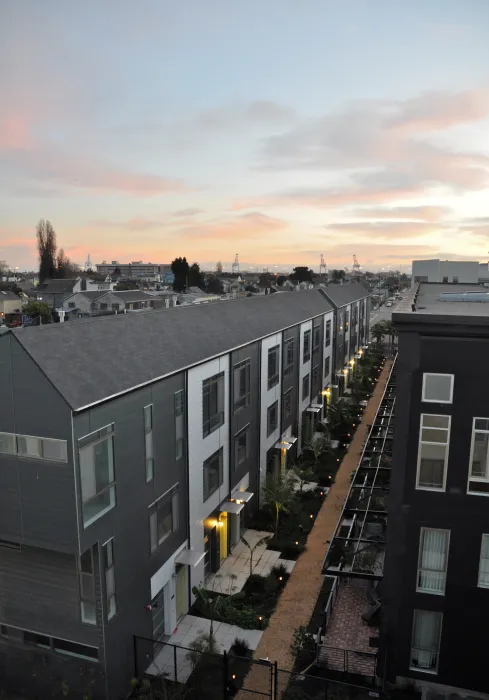 View of the resident pathway from above at Pacific Cannery Lofts in Oakland, California.