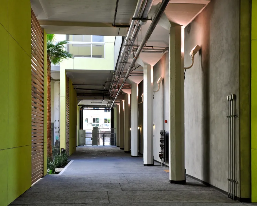 Looking down the ground floor open hallway at Pacific Cannery Lofts in Oakland, California.