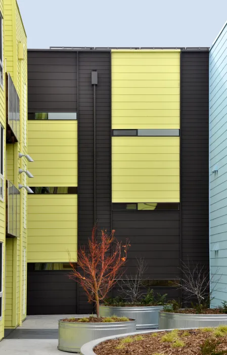 Exterior view of the courtyard fabric wall at Ironhorse at Central Station in Oakland, California.