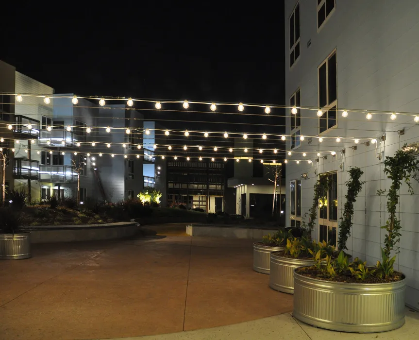 Courtyard at night at Ironhorse at Central Station in Oakland, California.