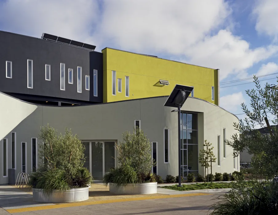 Exterior of community room at apartment building at Tassafaronga Village in East Oakland, CA. 