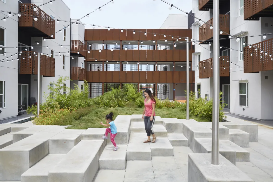 Child playing in the courtyard inside Rivermark in Sacramento, Ca.