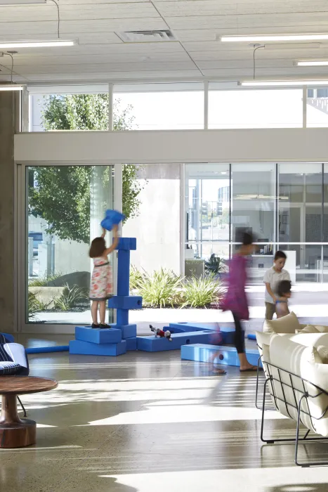 Community room looking out into the courtyard in Rivermark in Sacramento, Ca.