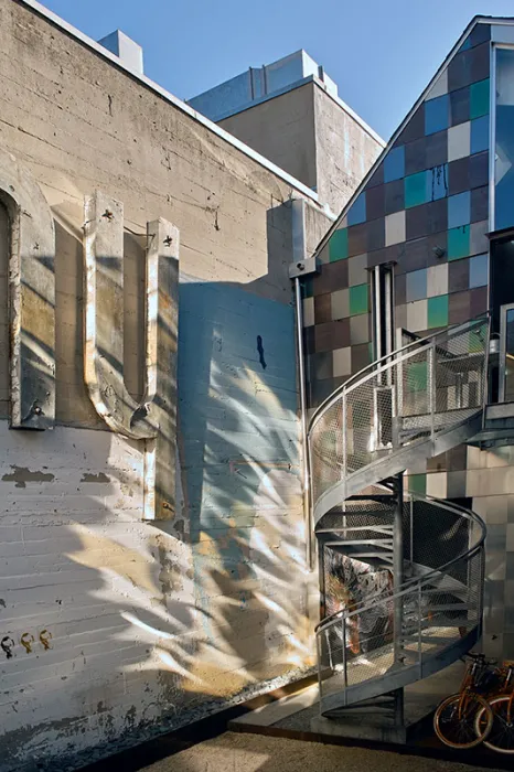 Courtyard and spiral stairs at Shotwell Design Lab in San Francisco.