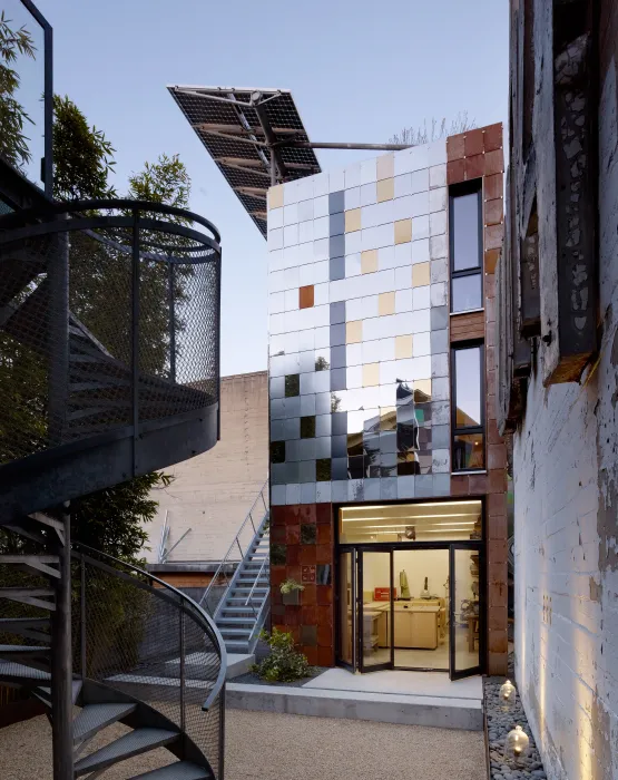 Exterior view of Zero Cottage in San Francisco at dusk.