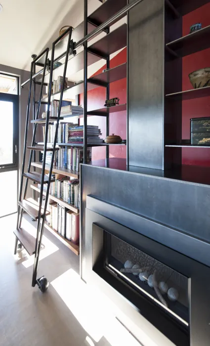 Bookcase and fireplace inside Healdsburg Rural House in Healdsburg, California.