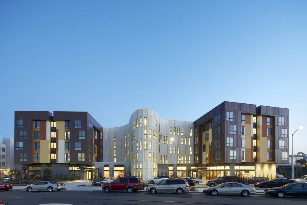 Street view of Dr. George Davis Senior Building in San Francisco at dusk..