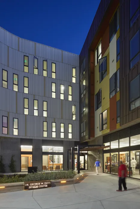 Entrance to Dr. George Davis Senior Building in San Francisco at night.