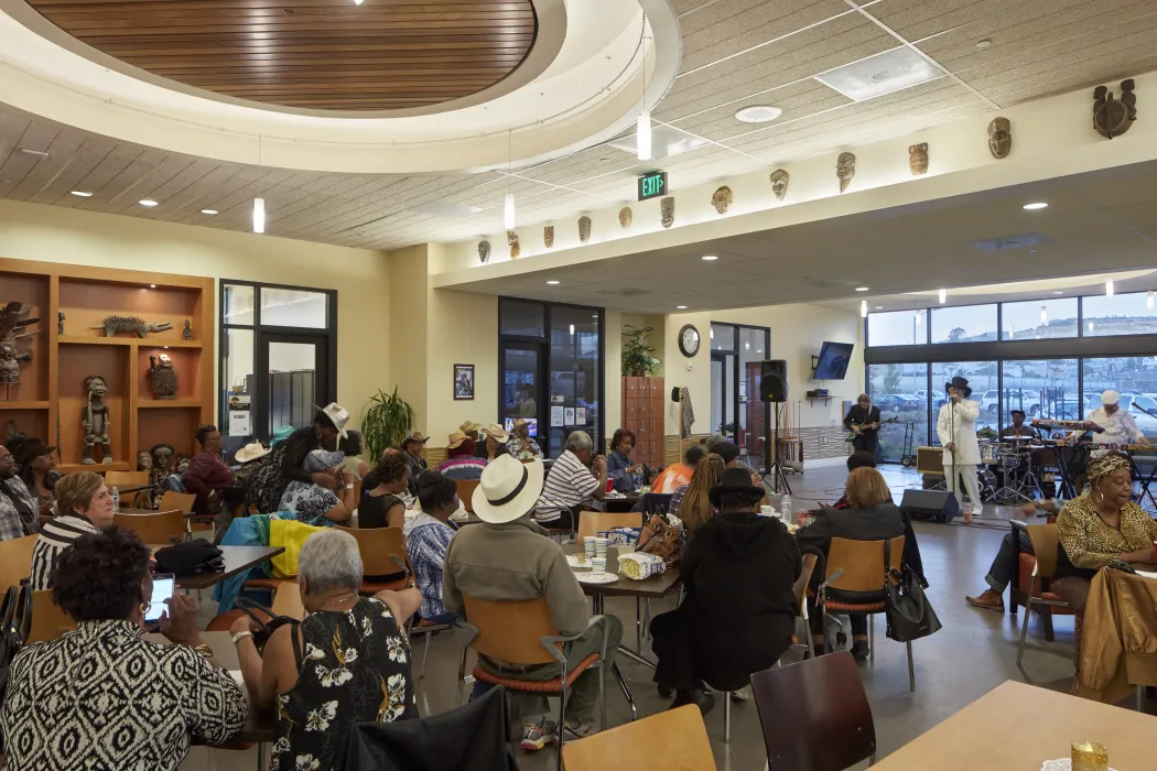 Residents watching a performance in Dr. George W. Davis Senior in San Francisco.