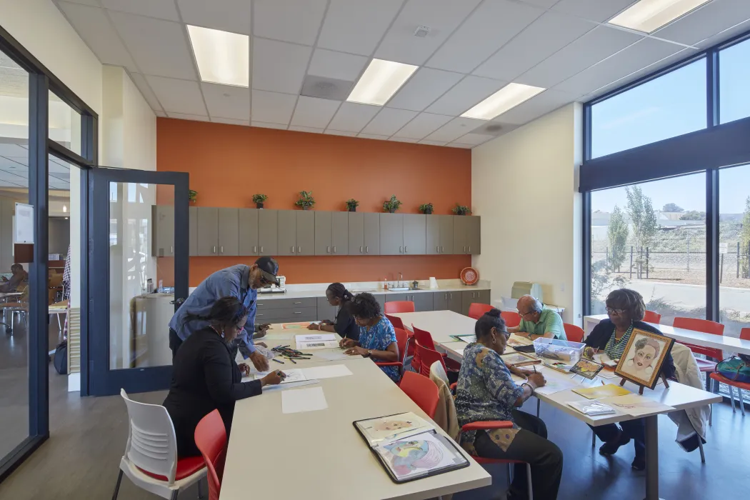 Residents in an art class inside Dr. George Davis Senior Building in San Francisco.