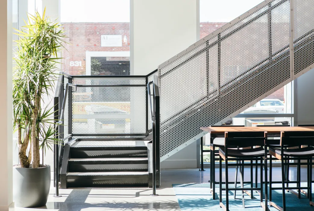 Leasing lounge leading to stairs at Foundry Commons in San Jose, Ca.