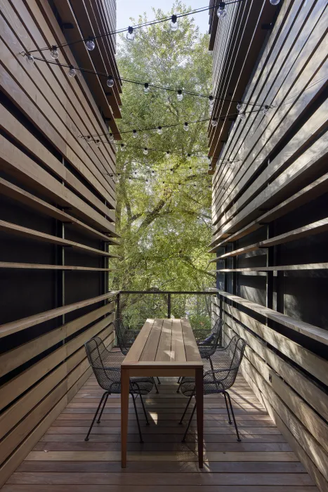 Balcony overlooking the trees inside Harmon Guest House in Healdsburg, Ca 