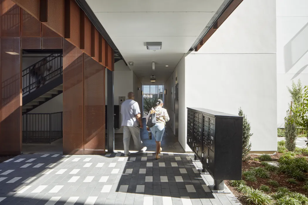 Open-air stairs and residential mailboxes at 847-848 Fairfax Avenue in San Francisco.