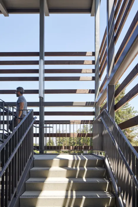 Exterior stairwell view of Onizuka Crossing Family Housing in Sunnyvale, California.