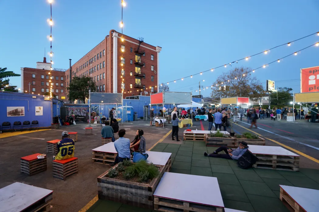 Pallet seating and garden beds at SPARC-It-Place on the future site for 34th and San Pablo Affordable Family Housing in Oakland, California.