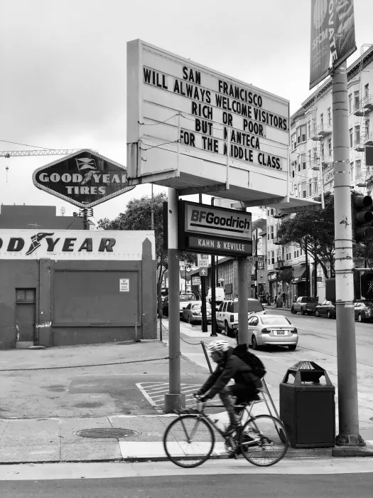 Sign at previous 555 Larkin site that states "San Francisco will always welcome visitors. Rich or poor. But Manteca for the middle class."