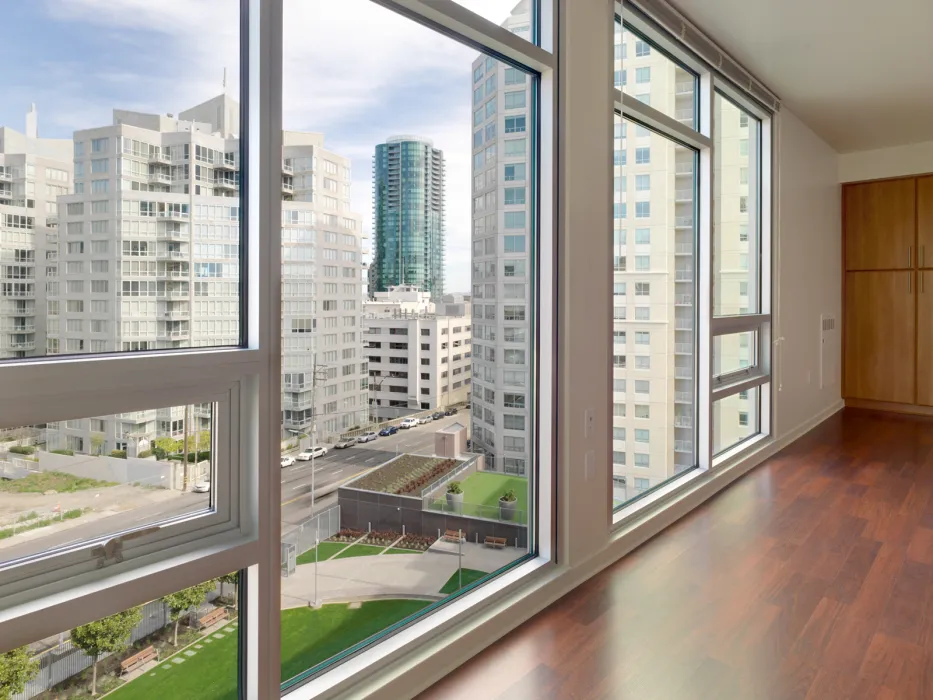 Unit inside Rincon Green with large windows looking out to a view of San Francisco.