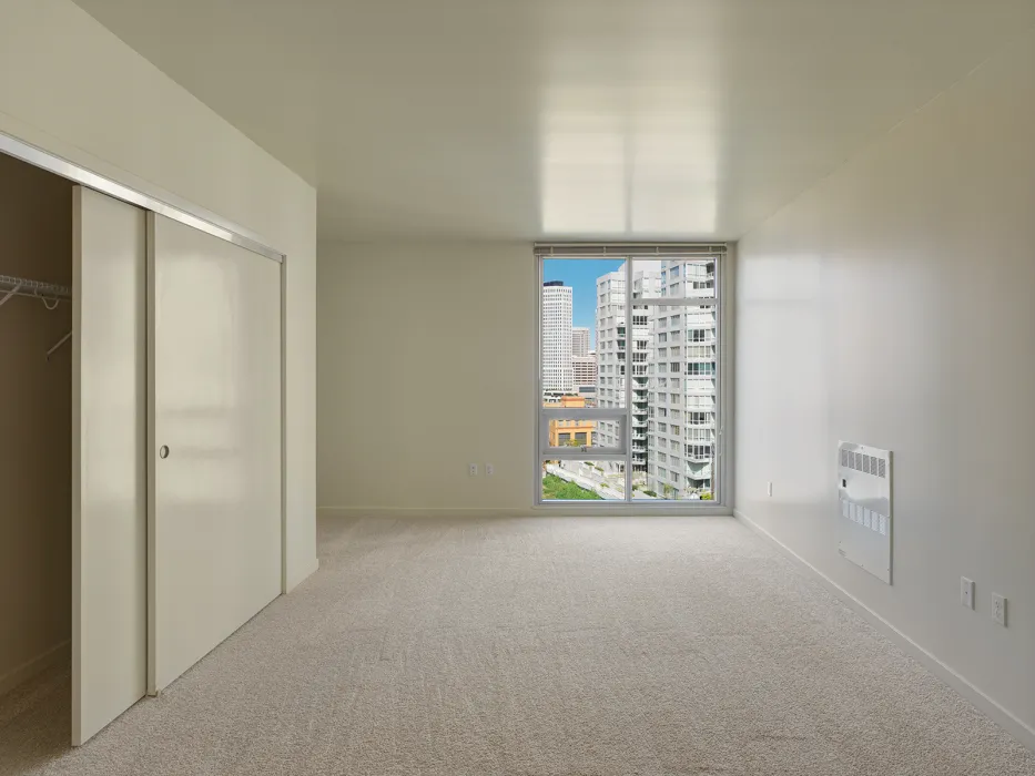 Bedroom inside a unit at Rincon Green in San Francisco.