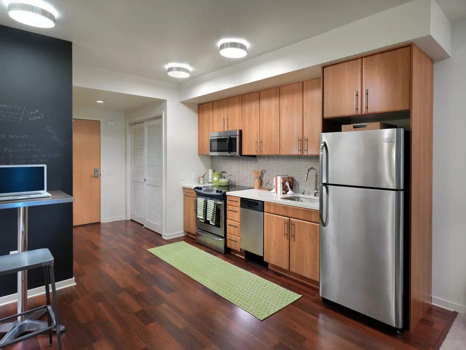 Interior view of a kitchen inside a unit at Rincon Green in San Francisco.