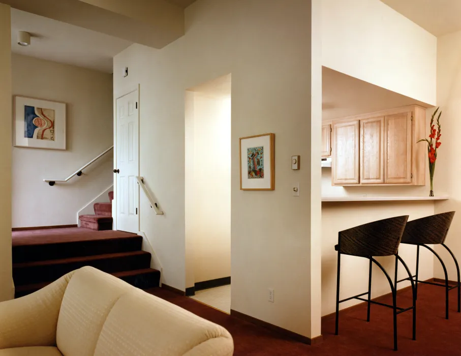 Interior view a unit living room and kitchen at Parkview Commons in San Francisco.