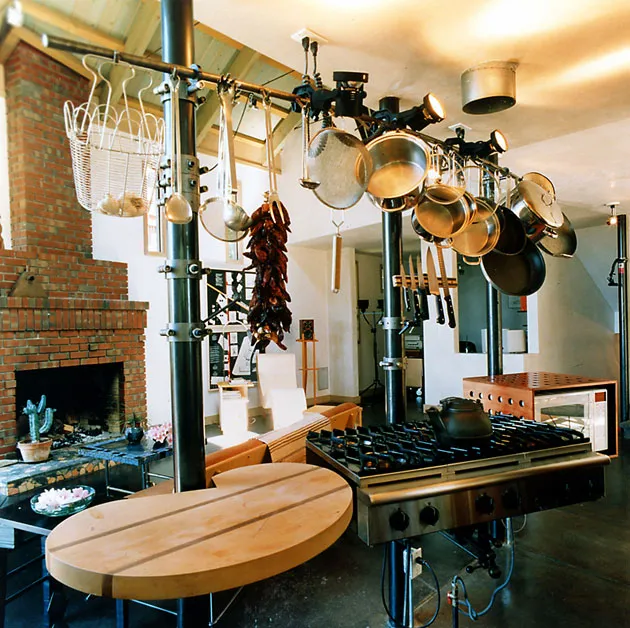 Interior kitchen and living room at Revenge of the Stuccoids in Berkeley, California.