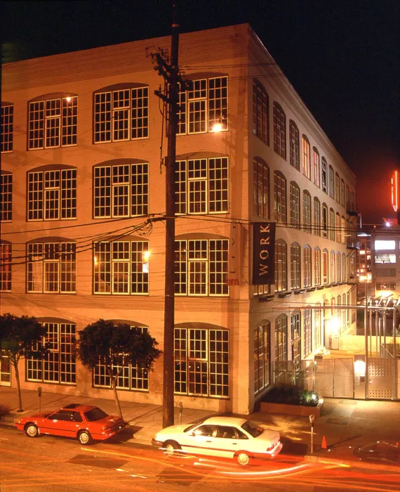 Exterior view of 355 Bryant Lofts in San Francisco at night.